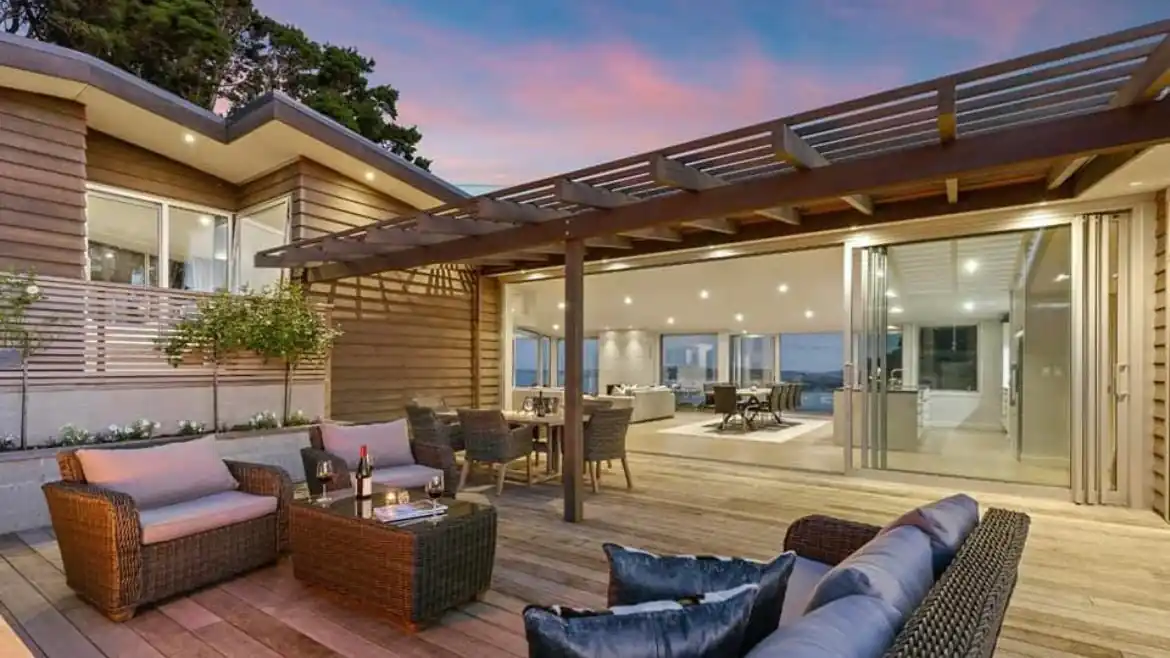 Indoor-outdoor flow improved with a simple deck addition, an affordable home renovation project in Auckland Indoor-outdoor flow improved with a simple deck addition, an affordable home renovation project in Auckland