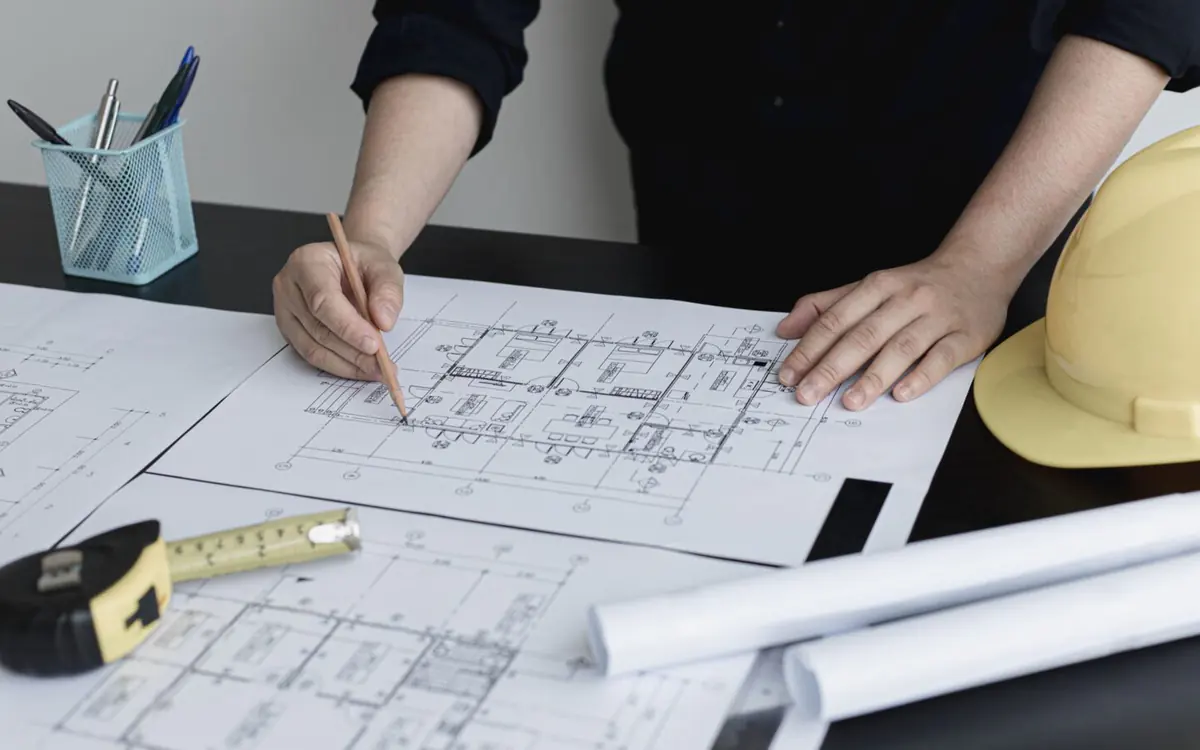 Renovation plans and a scale rule on a drawing, the basis for comparing renovation quotes fairly Renovation plans and a scale rule on a drawing, the basis for comparing renovation quotes fairly