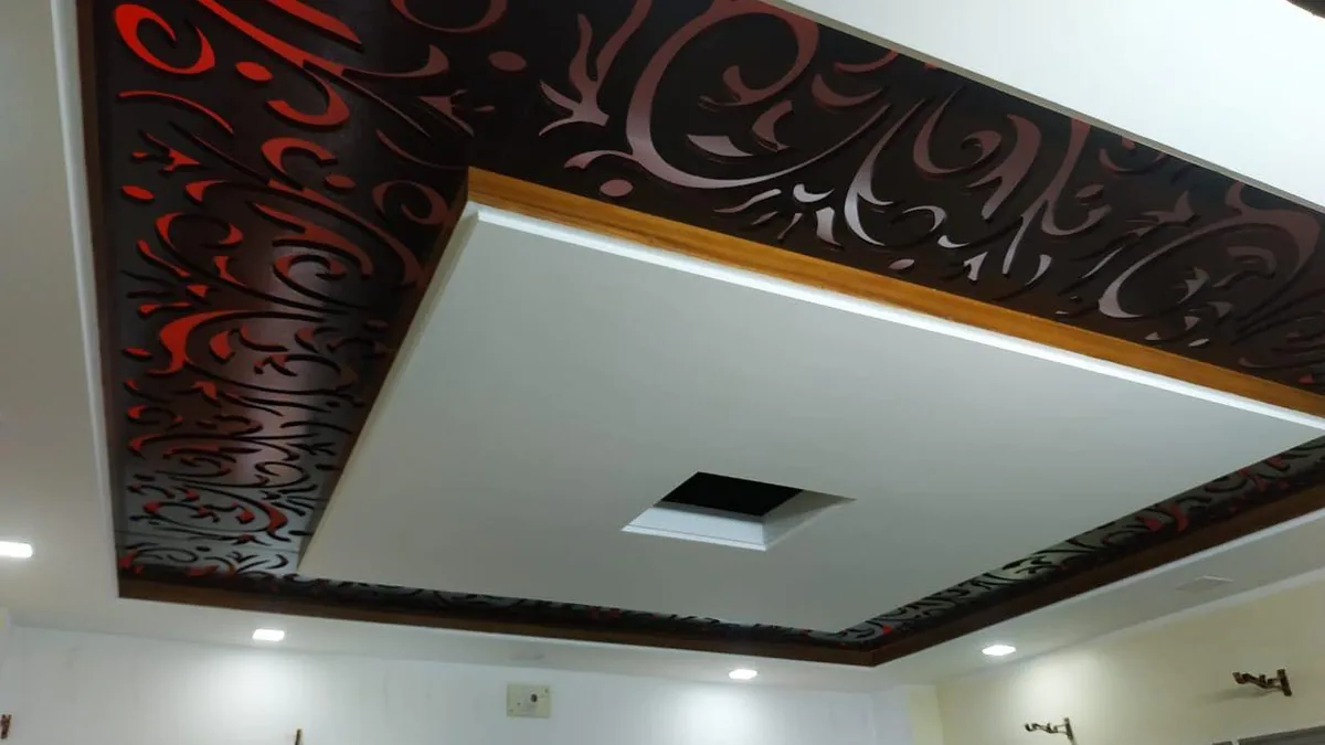 Feature ceiling with integrated downlights installed as part of a layered kitchen lighting plan Feature ceiling with integrated downlights installed as part of a layered kitchen lighting plan