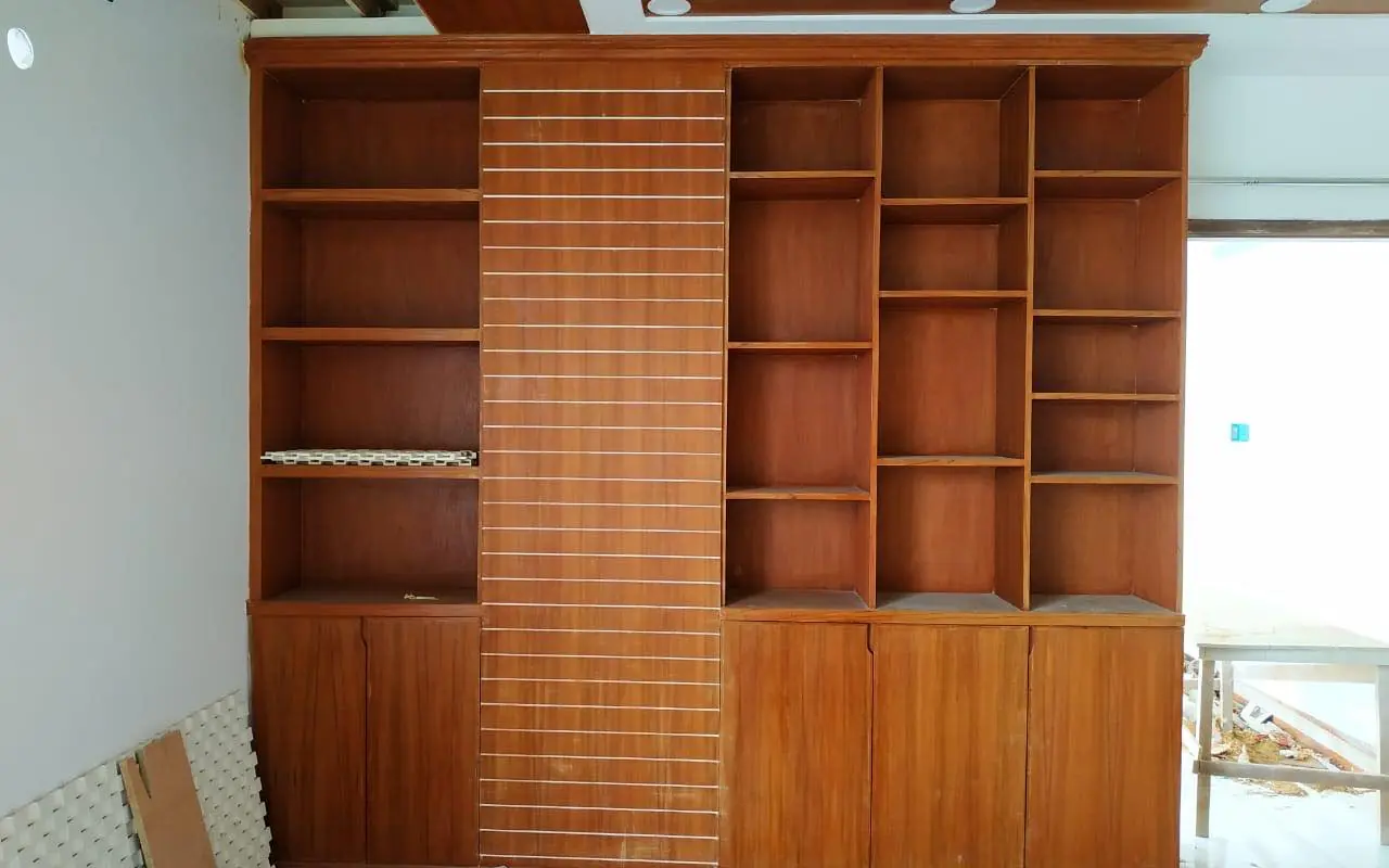 Stripped kitchen joinery documenting the original storage problem at the start of a kitchen renovation case study Stripped kitchen joinery documenting the original storage problem at the start of a kitchen renovation case study