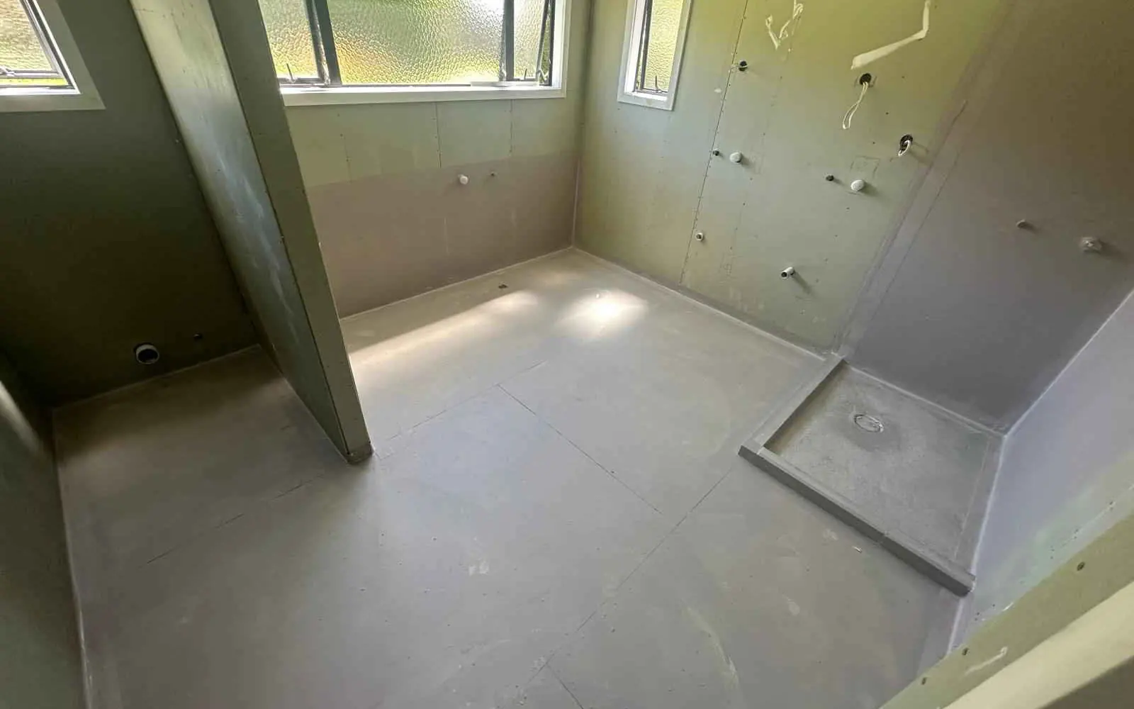 Stripped-back room where concealed conditions appear and are met from a renovation contingency budget Stripped-back room where concealed conditions appear and are met from a renovation contingency budget