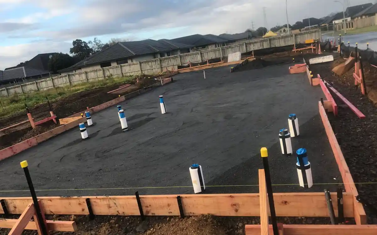 Concrete base prepared for an Auckland shed, the site works that storage shed cost must include Concrete base prepared for an Auckland shed, the site works that storage shed cost must include
