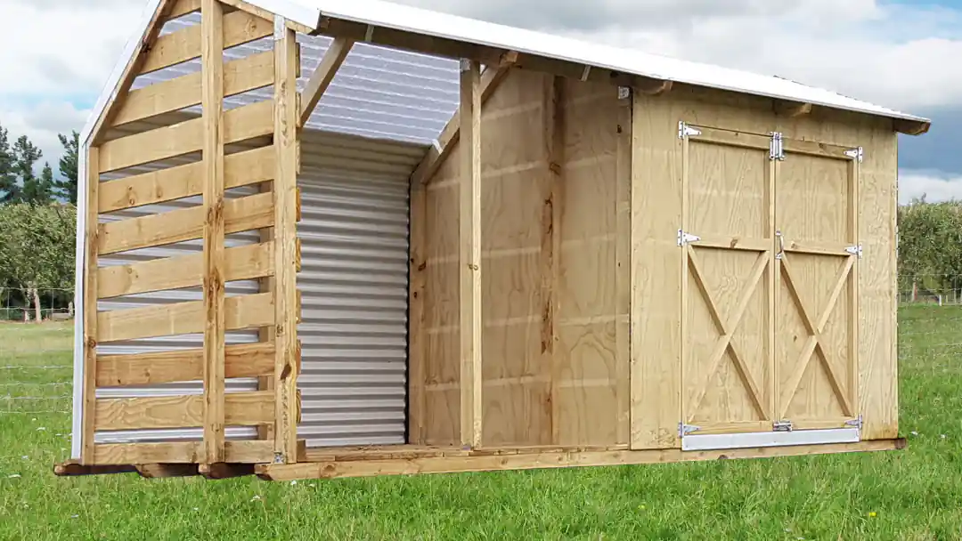Storage shed framed up on an Auckland property, showing the build stage priced into storage shed cost Storage shed framed up on an Auckland property, showing the build stage priced into storage shed cost