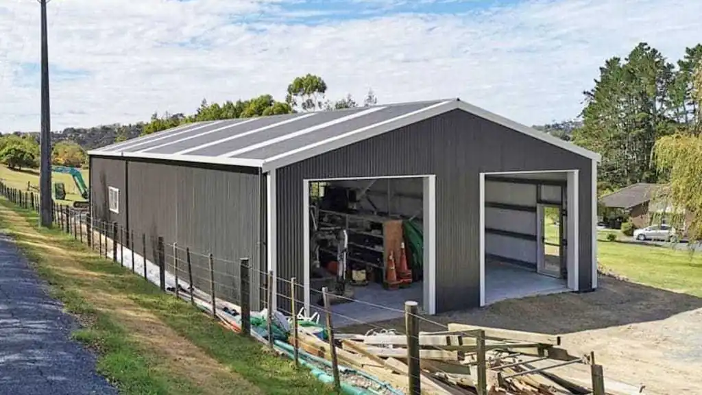 Timber-framed storage shed nearing completion in an Auckland backyard, built by a local storage shed specialist