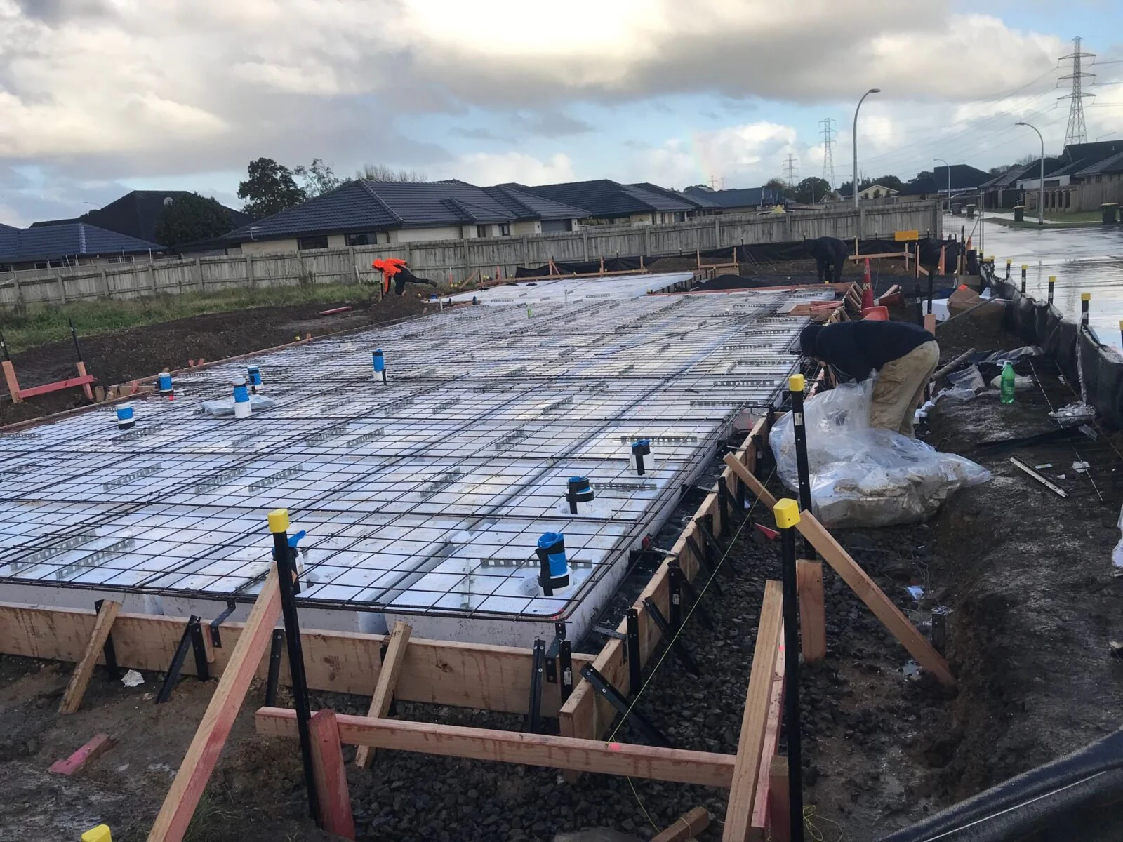 Concrete slab foundation prepared for an Auckland storage shed build